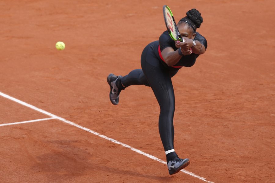 Serena Williams of the U.S. returns a shot against Krystyna Pliskova of the Czech Republic during their first round match of the French Open tennis tournament at the Roland Garros stadium in Paris, France, Tuesday, May 29, 2018. (AP Photo/Michel Euler) ORG XMIT: PDJ218