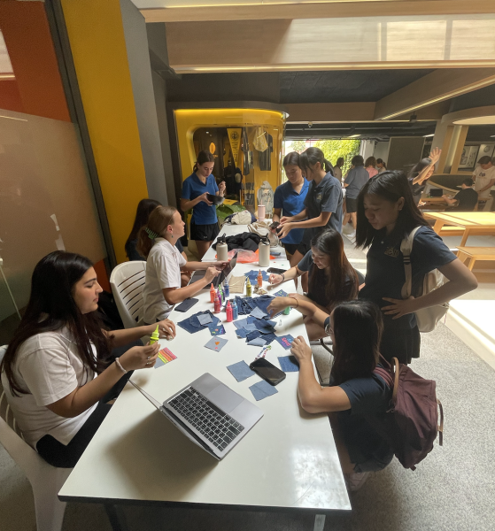 A PAVED club booth for Denim Day, May 2024.